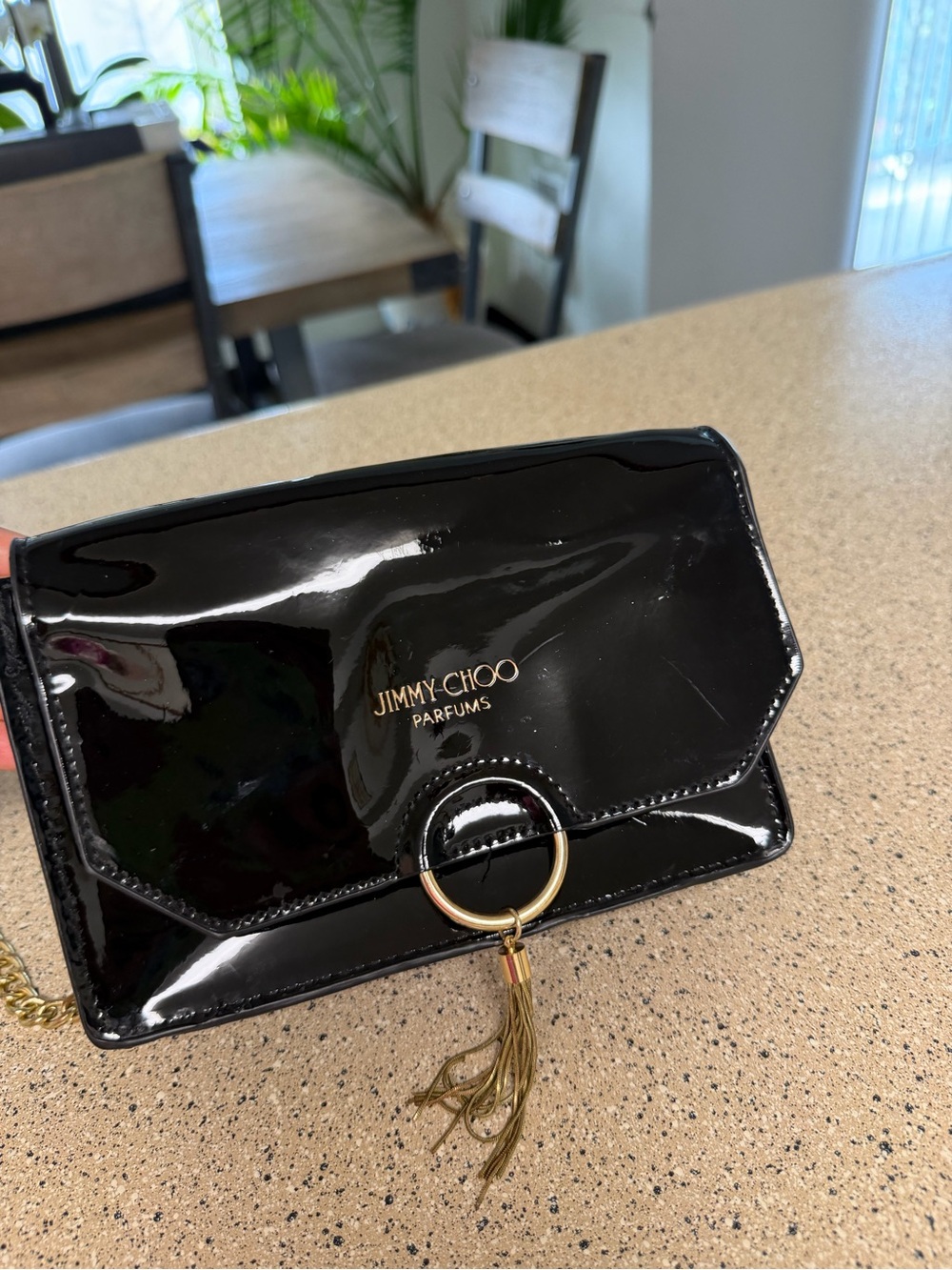 Jimmy Choo Black Patent Leather Crossbody with Gold Ring & Tassel
